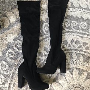 Thigh high black suede boots